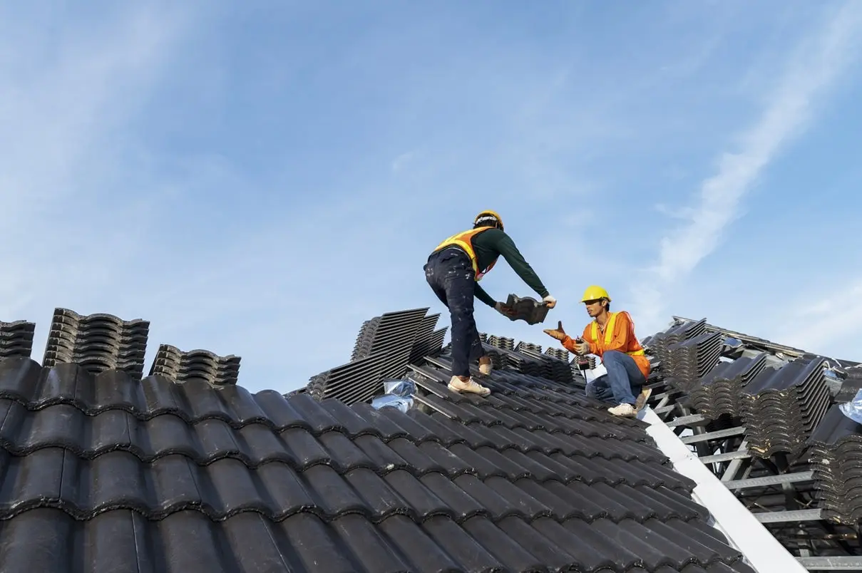 Roofers on a roof